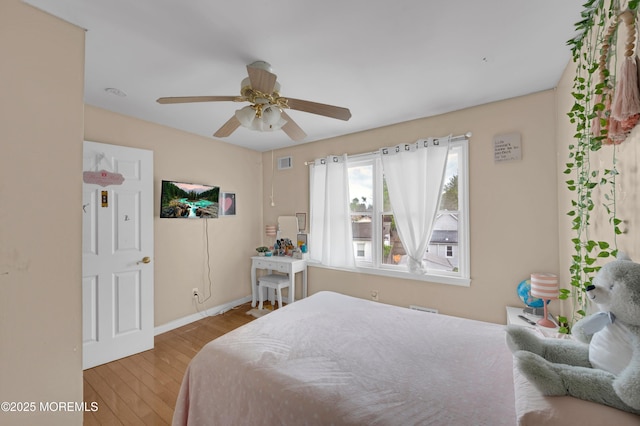40 Wood St, Keansburg, NJ 07734 - bedroom with wood finished floors, baseboards, and ceiling fan