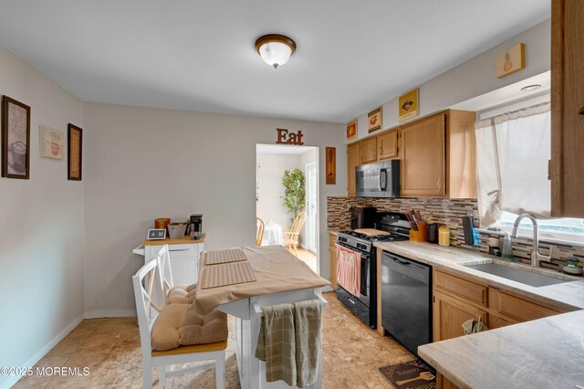 40 Wood St, Keansburg, NJ 07734 - kitchen with black appliances, a sink, light countertops, and decorative backsplash
