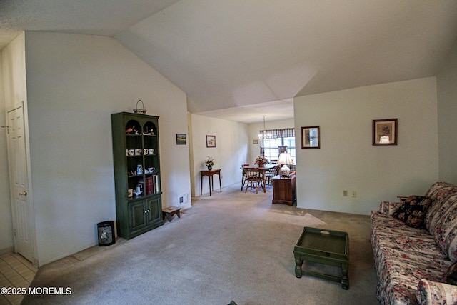 612 Petunia Ln S, Whiting, NJ 08759 - living room with light carpet, a chandelier, and vaulted ceiling