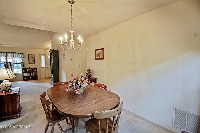 612 Petunia Ln S, Whiting, NJ 08759 - dining area with light carpet, a chandelier, and baseboards