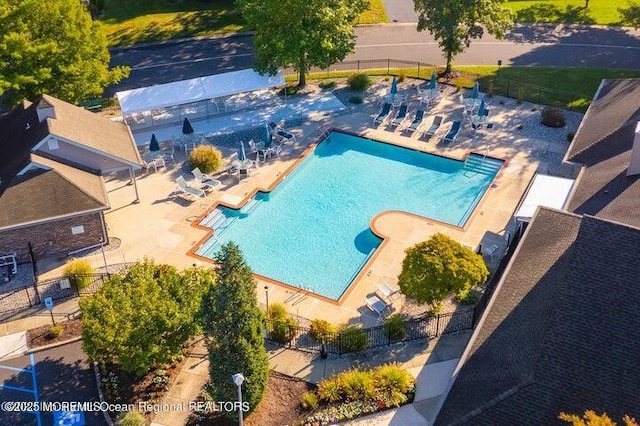 612 Petunia Ln S, Whiting, NJ 08759 - community pool featuring a patio area
