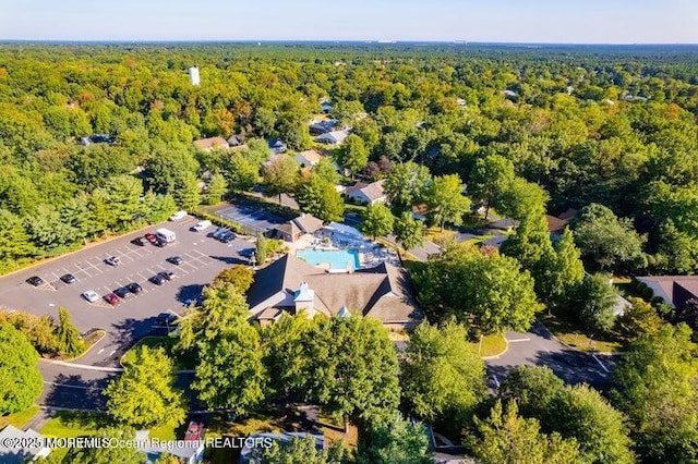 612 Petunia Ln S, Whiting, NJ 08759 - aerial view of a forest and a pool area