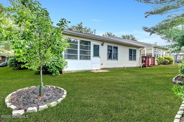 62 Woodshill Dr S, Lakewood, NJ 08701 - view of front of house featuring a front yard