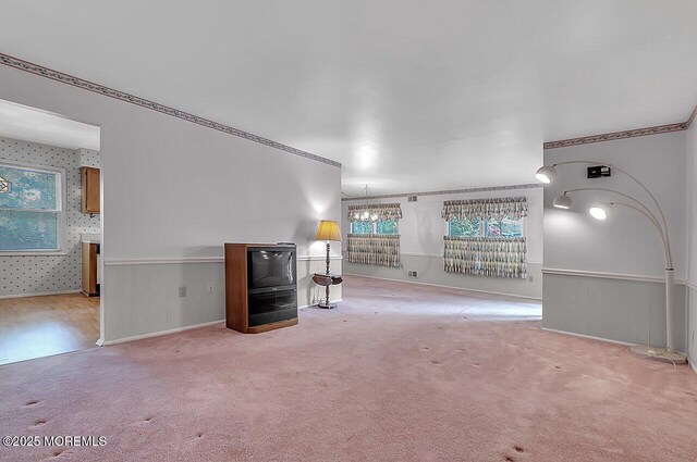 62 Woodshill Dr S, Lakewood, NJ 08701 - unfurnished living room featuring carpet floors and wallpapered walls