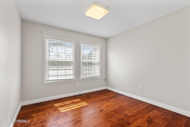 216 Franklin Pl, Morganville, NJ 07751 - empty room with hardwood / wood-style floors and baseboards