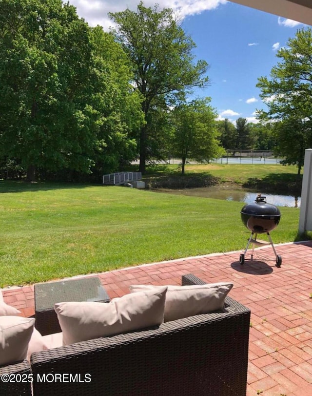 216 Franklin Pl, Morganville, NJ 07751 - view of patio featuring a water view and area for grilling