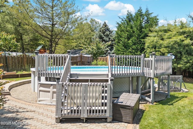 21 Tanglewood Pl, Monroe, NJ 08831 - view of swimming pool with a deck and view of scattered trees