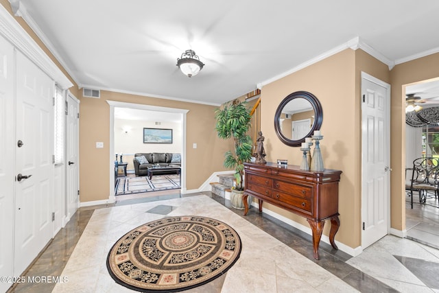 21 Tanglewood Pl, Monroe, NJ 08831 - entryway with baseboards, inlaid floor details, and ornamental molding