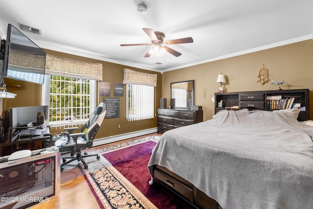 21 Tanglewood Pl, Monroe, NJ 08831 - bedroom with a baseboard heating unit, wood finished floors, ornamental molding, an office area, and ceiling fan