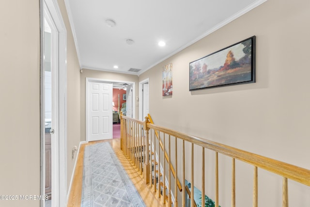 21 Tanglewood Pl, Monroe, NJ 08831 - hall with an upstairs landing, light wood finished floors, crown molding, recessed lighting, and baseboards