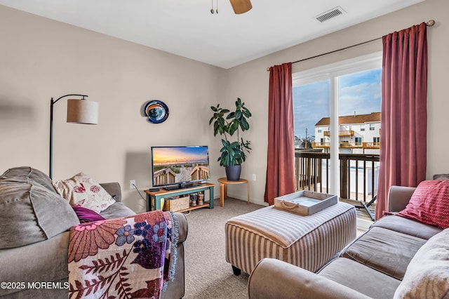 1090 Radio Rd Unit 12, Little Egg Harbor, NJ 08087 - carpeted living area featuring ceiling fan and baseboards