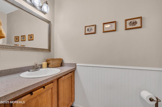 1090 Radio Rd Unit 12, Little Egg Harbor, NJ 08087 - bathroom with vanity and a wainscoted wall