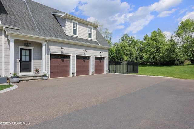5 Buchop Ln, Red Bank, NJ 07701 - view of side of property with a shingled roof, driveway, and an attached garage