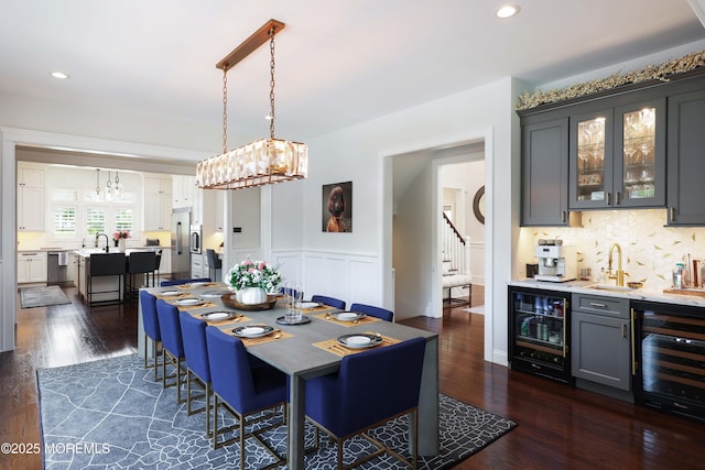 5 Buchop Ln, Red Bank, NJ 07701 - dining area with wine cooler, wet bar, stairs, dark wood-style floors, and recessed lighting