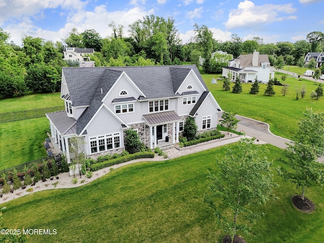 5 Buchop Ln, Red Bank, NJ 07701 - shingle-style home with a standing seam roof, stone siding, a metal roof, view of scattered trees, and roof with shingles
