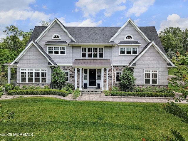 5 Buchop Ln, Red Bank, NJ 07701 - view of front of house with stone siding, a front yard, and roof with shingles