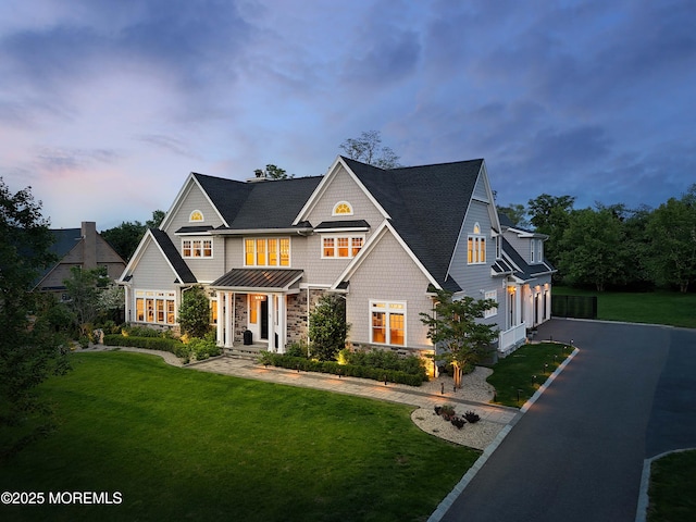 5 Buchop Ln, Red Bank, NJ 07701 - shingle-style home with driveway, stone siding, a lawn, and an attached garage