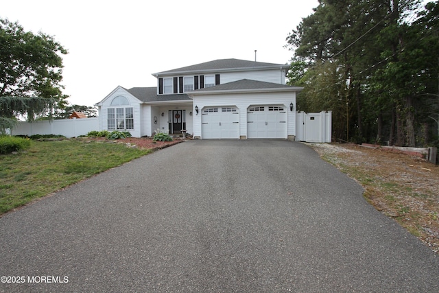 132 Sloop Rd, Manahawkin, NJ 08050 - traditional home with driveway and an attached garage
