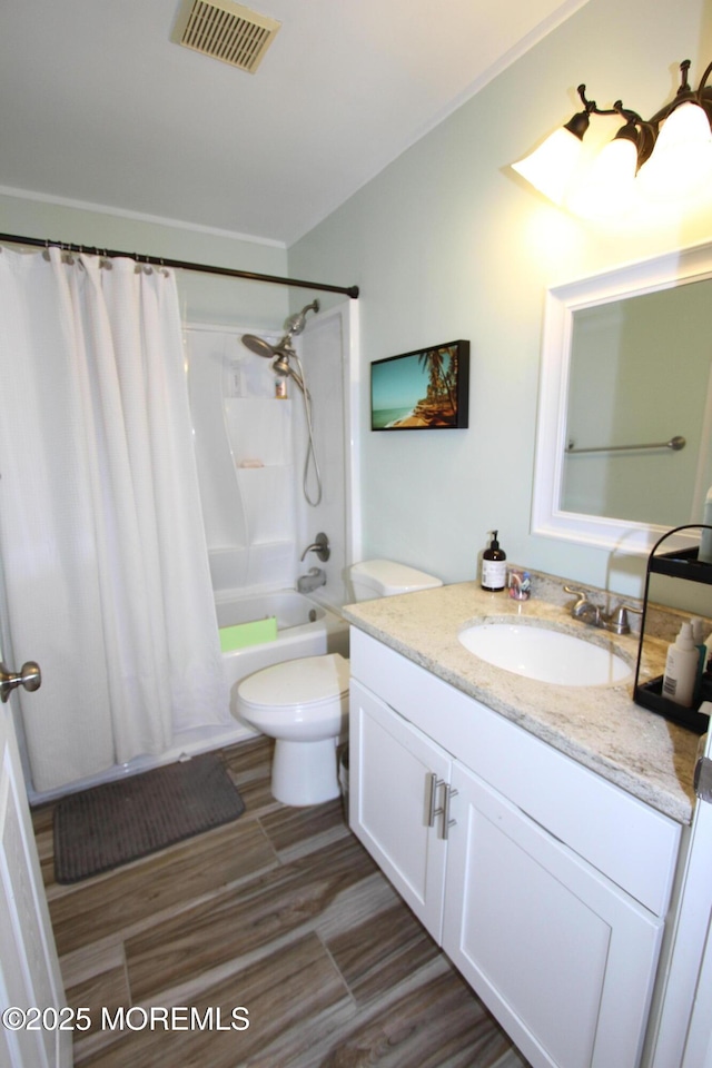 132 Sloop Rd, Manahawkin, NJ 08050 - full bathroom with vanity, toilet, shower / tub combo with curtain, and wood finished floors