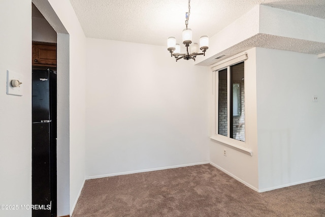 117 Northrup Dr, Brick, NJ 08724 - carpeted empty room with a chandelier, a textured ceiling, and baseboards