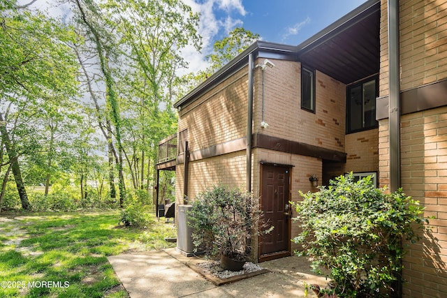 117 Northrup Dr, Brick, NJ 08724 - entrance to property with brick siding and a balcony