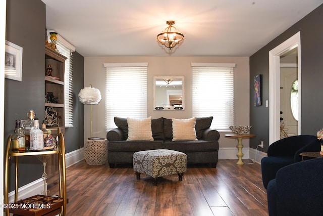 202 Main St, Matawan, NJ 07747 - living area with plenty of natural light, wood finished floors, and baseboards