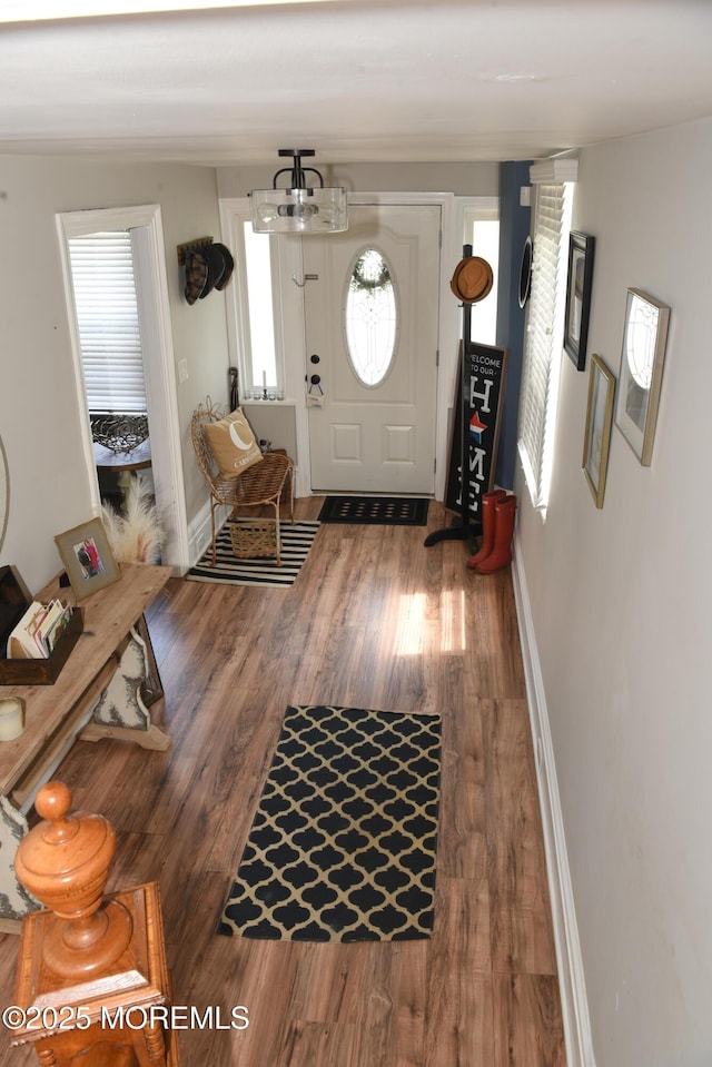 202 Main St, Matawan, NJ 07747 - foyer featuring wood finished floors and baseboards