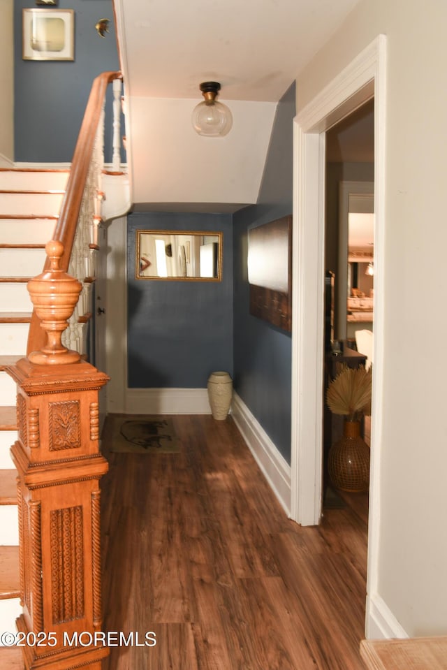 202 Main St, Matawan, NJ 07747 - foyer with dark wood-type flooring, baseboards, and stairway