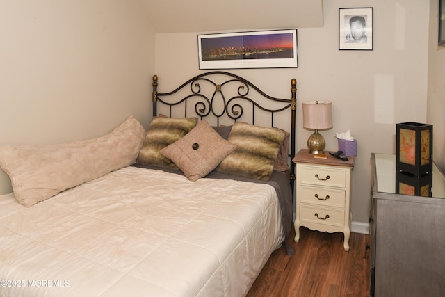 202 Main St, Matawan, NJ 07747 - bedroom with dark wood finished floors and lofted ceiling