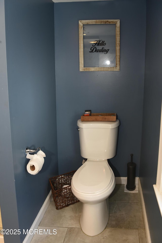 202 Main St, Matawan, NJ 07747 - bathroom featuring toilet, tile patterned floors, and baseboards