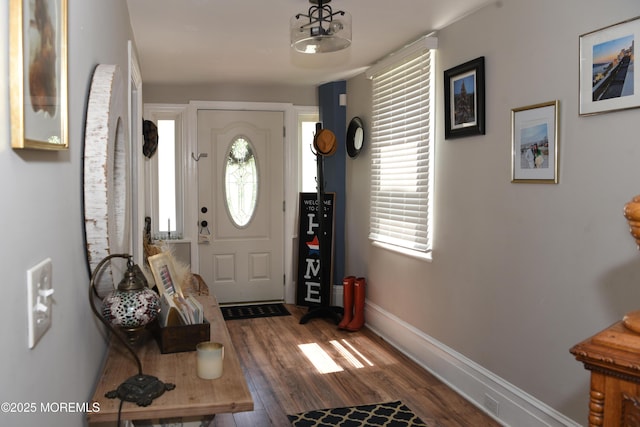 202 Main St, Matawan, NJ 07747 - foyer entrance featuring wood finished floors and baseboards