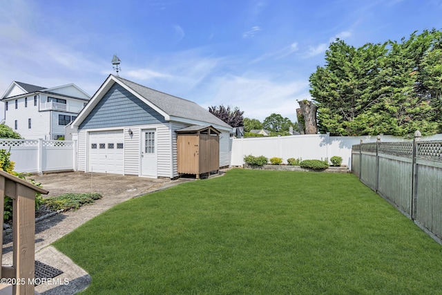 404 Saint Louis Ave, Point Pleasant Beach, NJ 08742 - fenced backyard with a detached garage and a shed