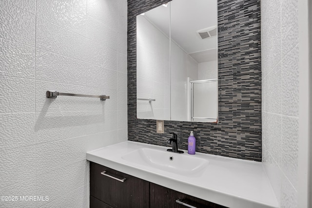 152 Redpine Loop, Old Bridge, NJ 08857 - bathroom with vanity, tile walls, backsplash, and an enclosed shower