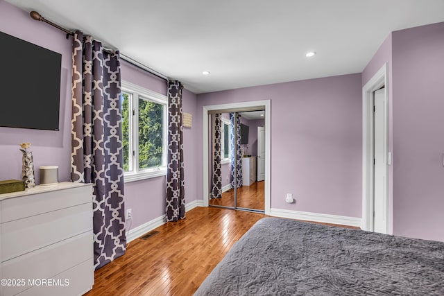 152 Redpine Loop, Old Bridge, NJ 08857 - unfurnished bedroom featuring wood-type flooring, recessed lighting, baseboards, and a closet