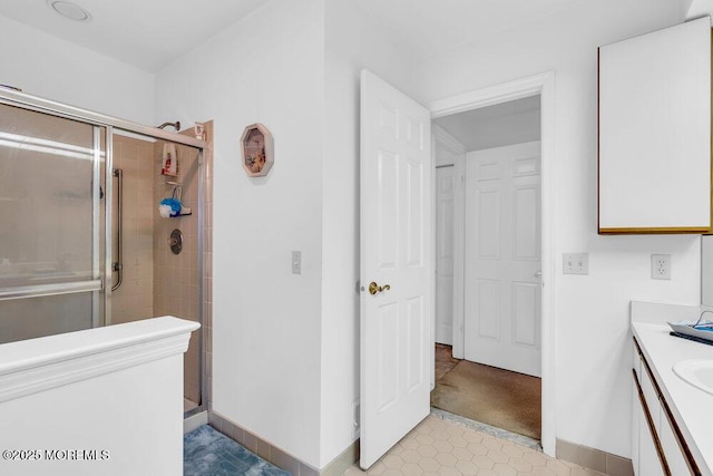 551 Petunia Ln N, Whiting, NJ 08759 - full bathroom featuring a stall shower, double vanity, and tile patterned floors