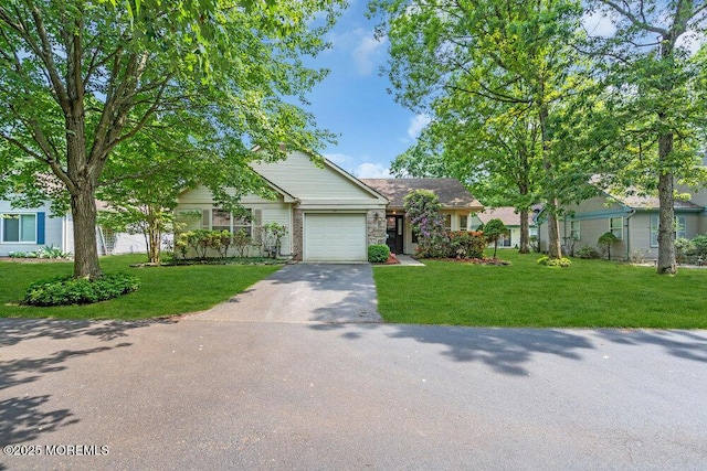 551 Petunia Ln N, Whiting, NJ 08759 - view of front of home with driveway, a garage, and a front lawn