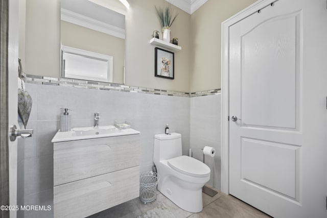 14 White Oak Ln, Aberdeen, NJ 07747 - half bathroom with tile walls, crown molding, vanity, toilet, and tile patterned flooring