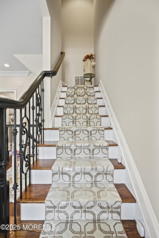 14 White Oak Ln, Aberdeen, NJ 07747 - stairway with wood finished floors and ornamental molding