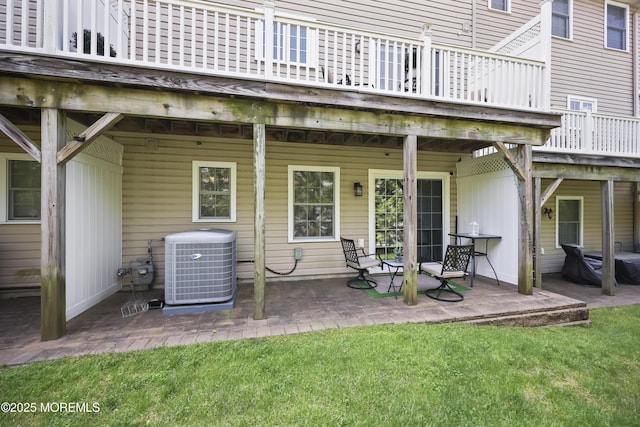 14 White Oak Ln, Aberdeen, NJ 07747 - rear view of house with cooling unit, a patio, a wooden deck, and a yard