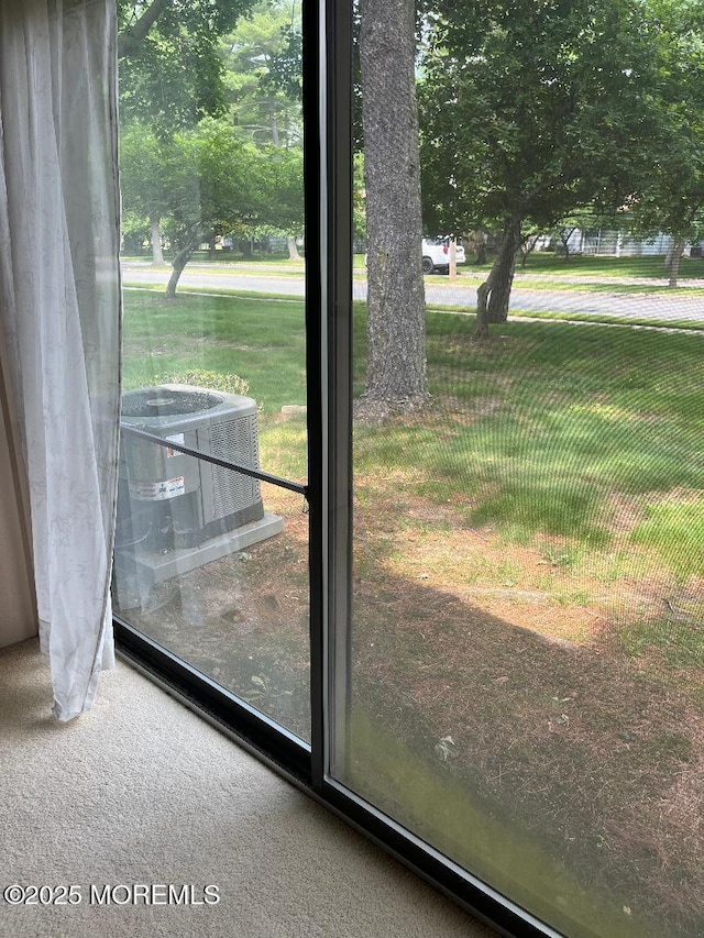 212 Covered Bridge Blvd Unit D, Manalapan, NJ 07726 - detailed view of carpet and central AC unit