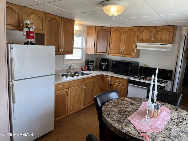 7 Grace Ln, Howell, NJ 07731 - kitchen with white appliances, under cabinet range hood, a sink, a drop ceiling, and brown cabinetry