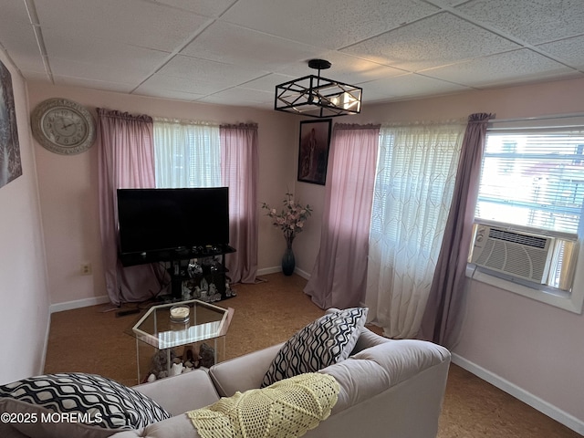 7 Grace Ln, Howell, NJ 07731 - carpeted living room with healthy amount of natural light, baseboards, a paneled ceiling, and cooling unit