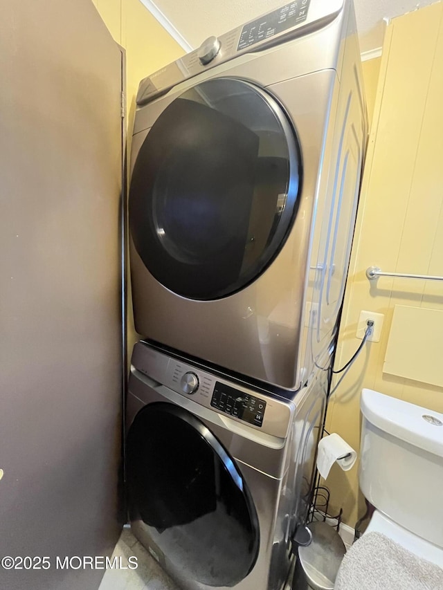 7 Grace Ln, Howell, NJ 07731 - laundry room featuring stacked washer and clothes dryer