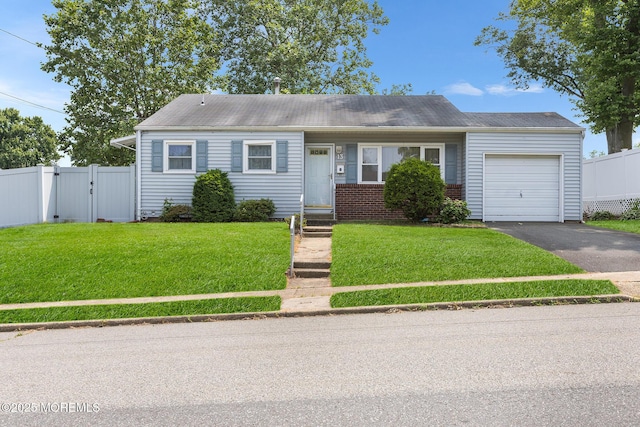 13 Copper Ln, Hazlet, NJ 07730 - view of front of house with an attached garage, asphalt driveway, and a gate