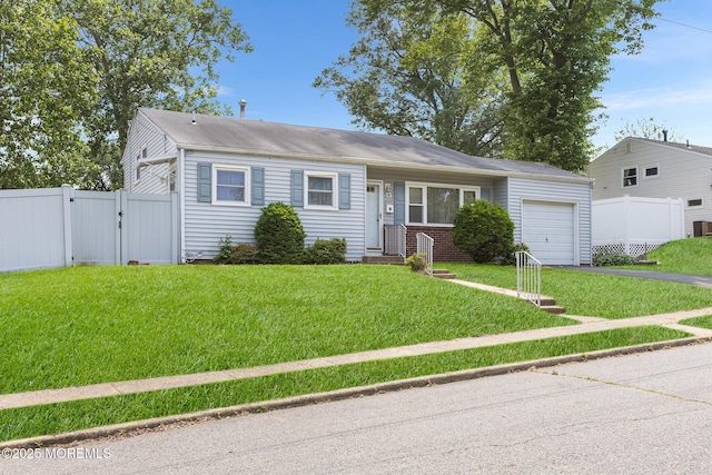 13 Copper Ln, Hazlet, NJ 07730 - view of front of home featuring an attached garage, driveway, and a gate