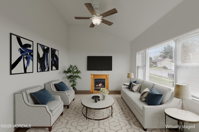 13 Copper Ln, Hazlet, NJ 07730 - living room featuring a warm lit fireplace, high vaulted ceiling, and ceiling fan