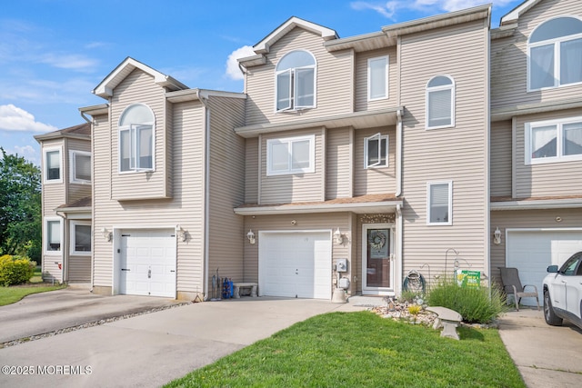 19 Corpus Cristi Bay Ct, Little Egg Harbor, NJ 08087 - townhome / multi-family property with an attached garage and concrete driveway