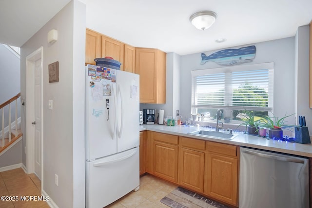 19 Corpus Cristi Bay Ct, Little Egg Harbor, NJ 08087 - kitchen featuring freestanding refrigerator, dishwasher, a sink, light tile patterned floors, and light countertops