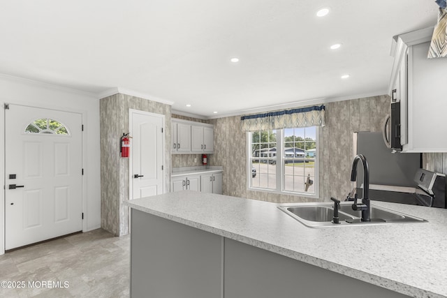 5 Pigeon Ct, Whiting, NJ 08759 - kitchen with stainless steel appliances, a sink, light countertops, a peninsula, and recessed lighting