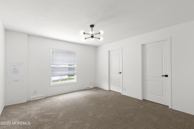 5 Pigeon Ct, Whiting, NJ 08759 - unfurnished bedroom with carpet floors, a chandelier, and baseboards
